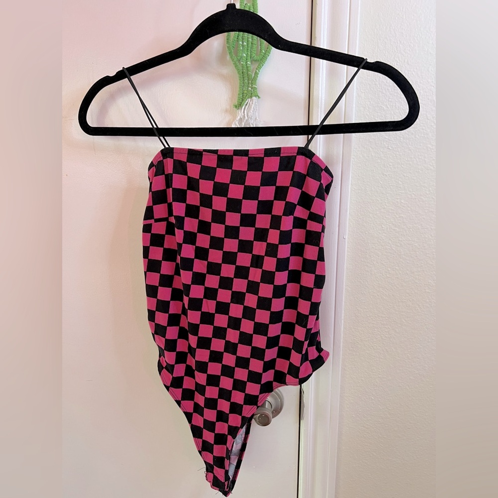 Pink and black checkered bodysuit